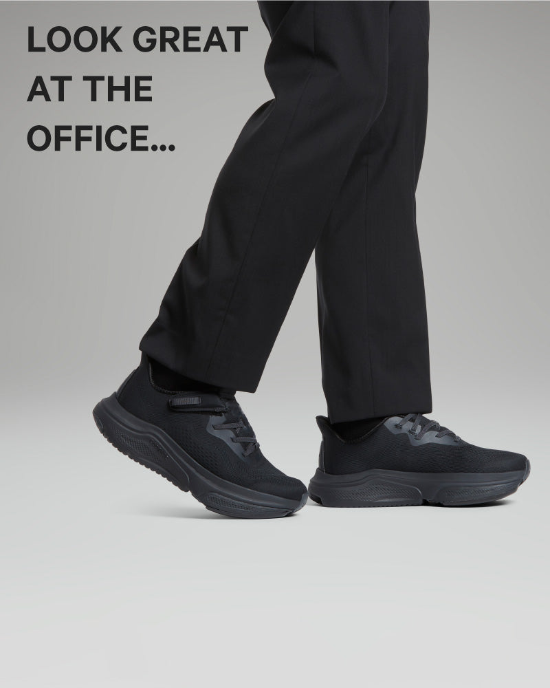 Person wearing black shoes and pants with text 'LOOK GREAT AT THE OFFICE...' on a gray background