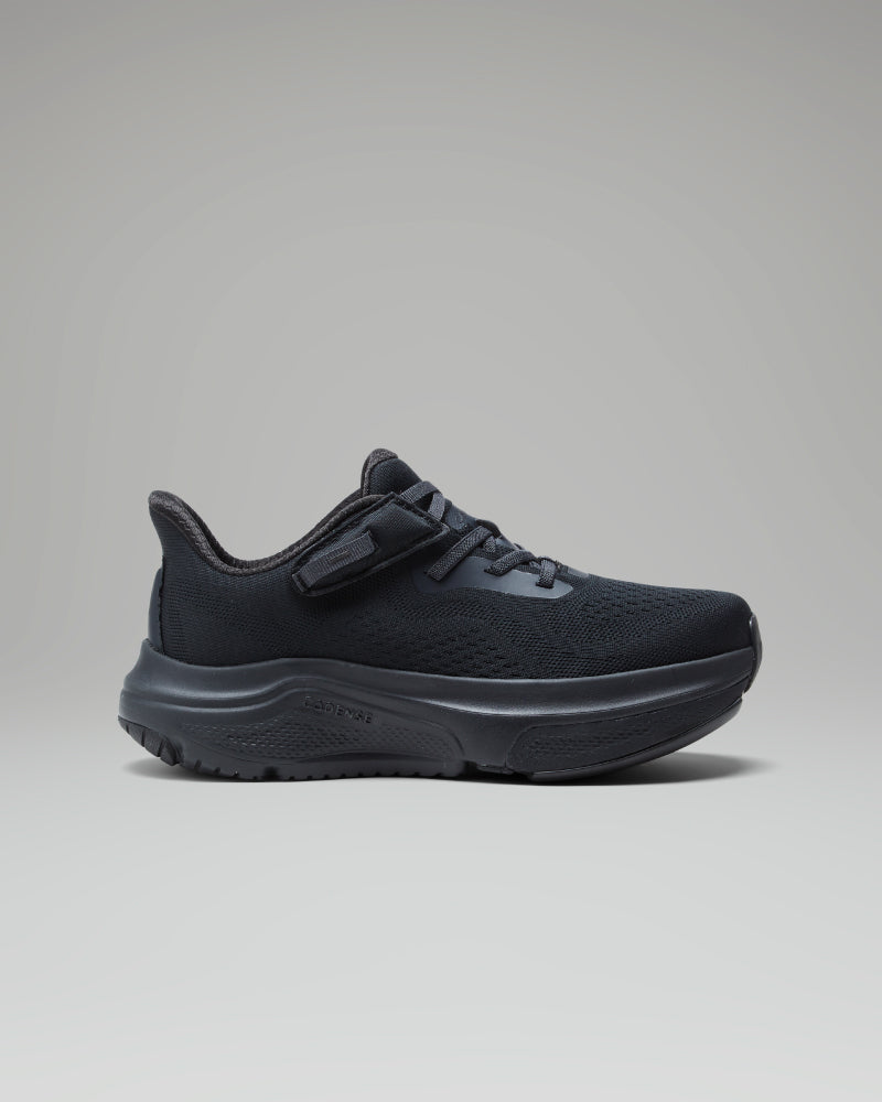 Black athletic shoe on a gray background