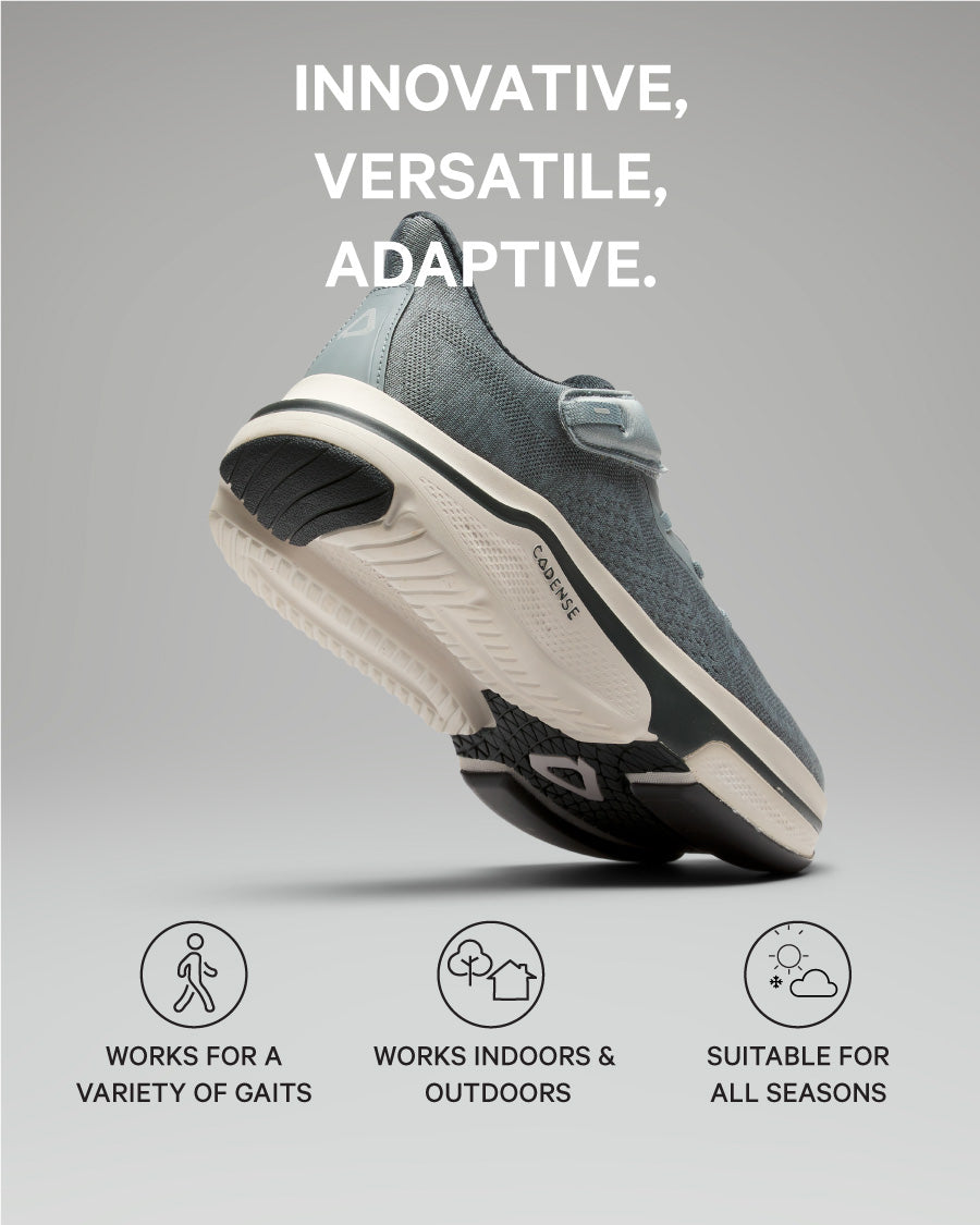 Gray athletic shoe on a gray background with text highlighting features