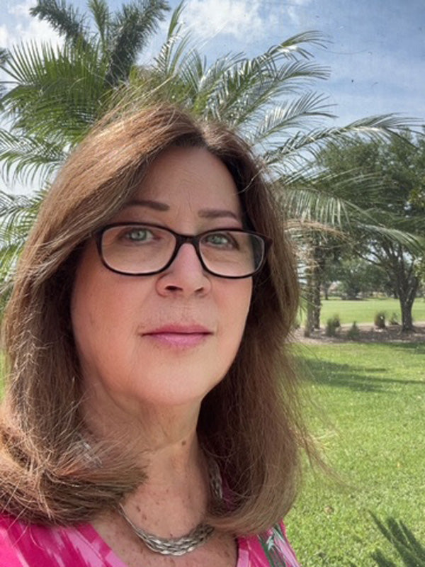 Headshot of Ro Susko