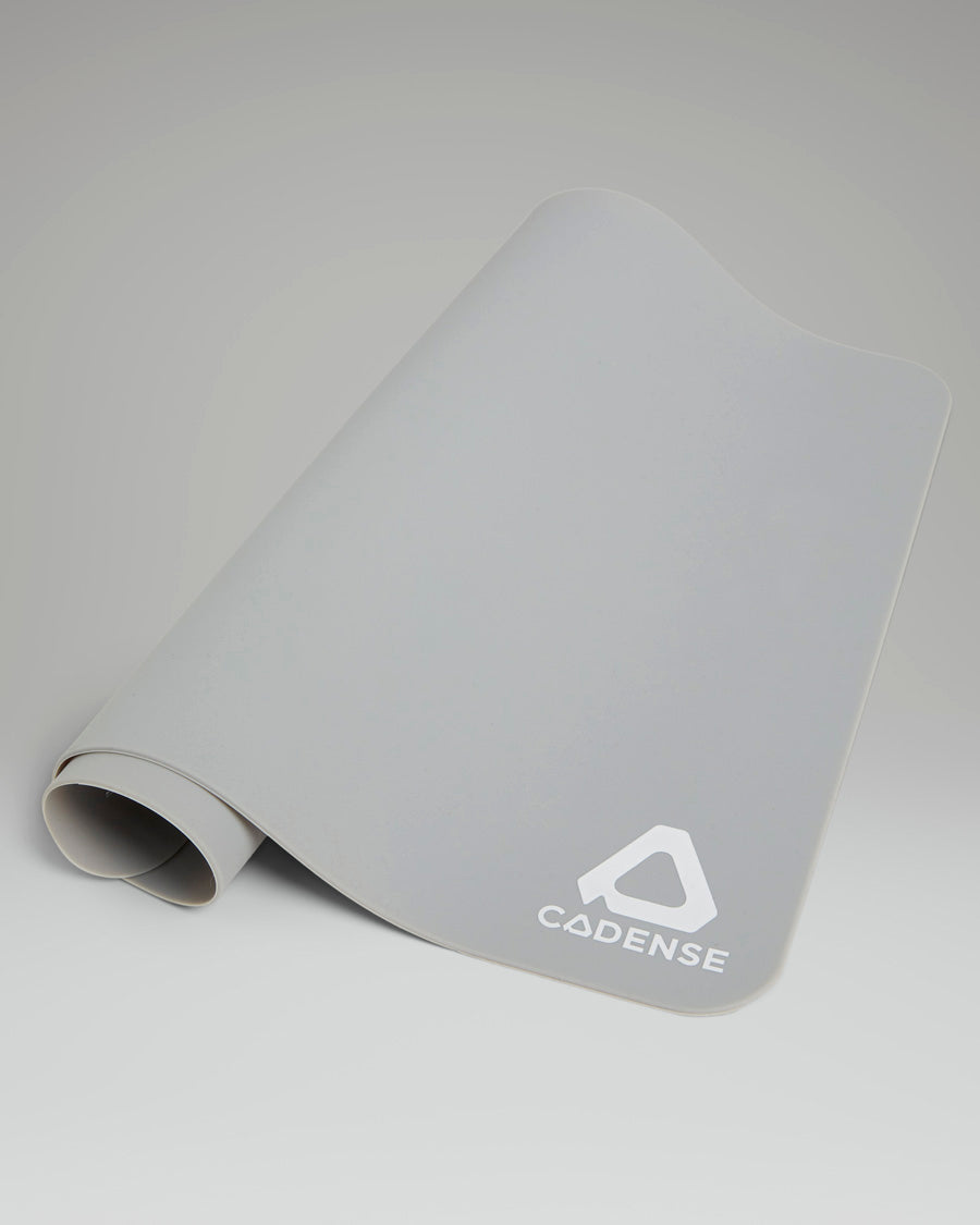 Gray mat with a logo on a light gray background