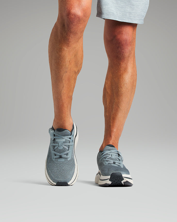 man wearing cadense original adaptive shoes in gray