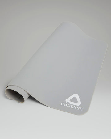 Gray mat with a logo on a light gray background