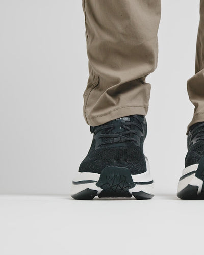 Man moving in Cadense adaptive sneakers